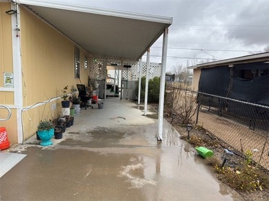 Look no further! This well-maintained manufactured home sits on