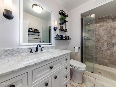Experience luxury lakefront living in this beautifully updated 2 - photo 11