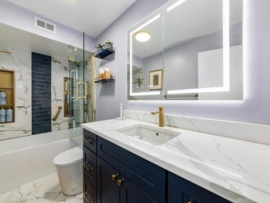 Experience luxury lakefront living in this beautifully updated 2 - photo 14