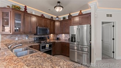 Welcome in to this spacious 3BR, 2BA walk-out level condo in