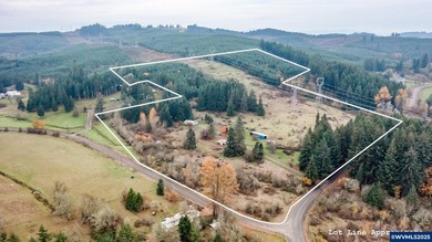 Set on 32.34 private acres, this true horse property features a - photo 2