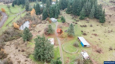 Set on 32.34 private acres, this true horse property features a - photo 3