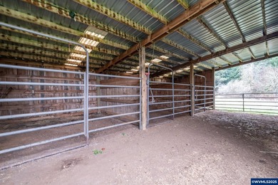 Set on 32.34 private acres, this true horse property features a - photo 4