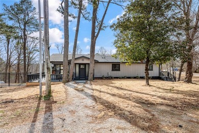 Awaiting your guests or family is this private 11+ acre retreat - photo 4