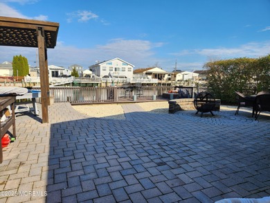Nestled in the charming Mystic Island waterfront community, this - photo 3