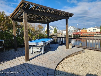 Nestled in the charming Mystic Island waterfront community, this - photo 5
