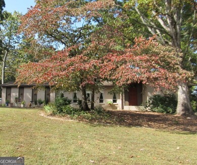 Solid home located in Lake Capri. Expansive, private deck on the - photo 2