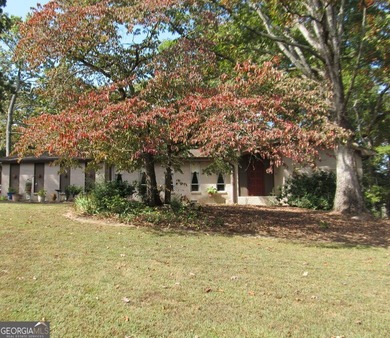 Solid home located in Lake Capri. Expansive, private deck on the - photo 3