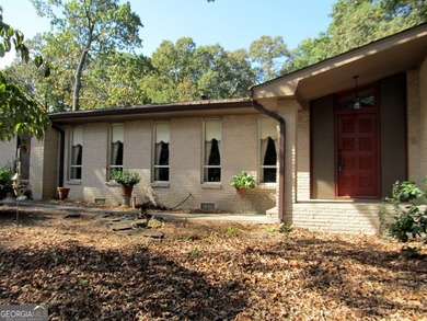Solid home located in Lake Capri. Expansive, private deck on the - photo 6