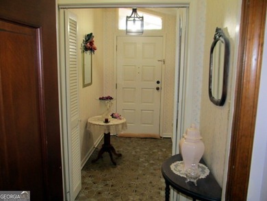 Solid home located in Lake Capri. Expansive, private deck on the - photo 8