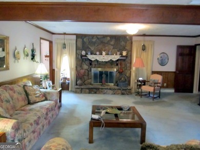 Solid home located in Lake Capri. Expansive, private deck on the - photo 9