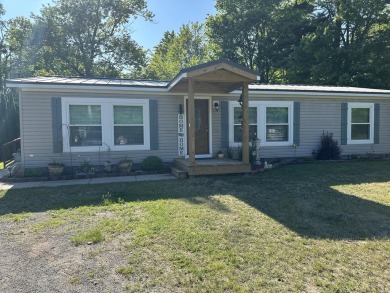 Lake Home For Sale in Alpena, Michigan