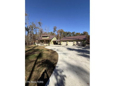 This Beautiful home, nestled on a wooded 5.4 acre lot is like - photo 1