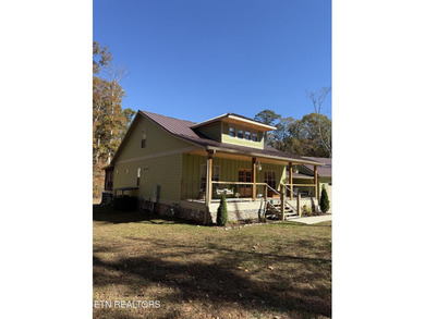 This Beautiful home, nestled on a wooded 5.4 acre lot is like - photo 2