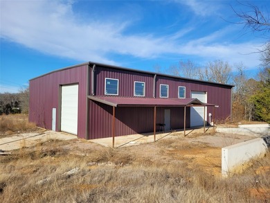 Custom-built steel shop home built in 2022 on over 10 acres - photo 1