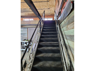 Custom-built steel shop home built in 2022 on over 10 acres - photo 6