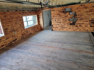 Custom-built steel shop home built in 2022 on over 10 acres - photo 8