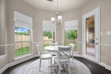 Come experience this exceptional former Drees model home - photo 13
