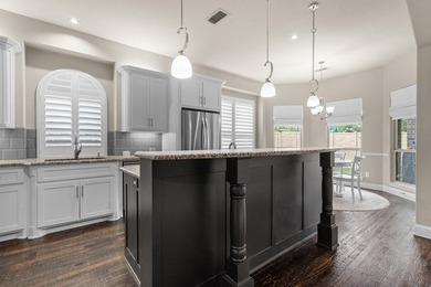 Come experience this exceptional former Drees model home - photo 15
