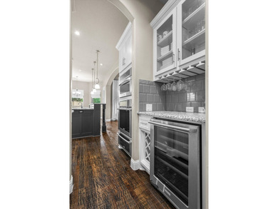 Come experience this exceptional former Drees model home - photo 17