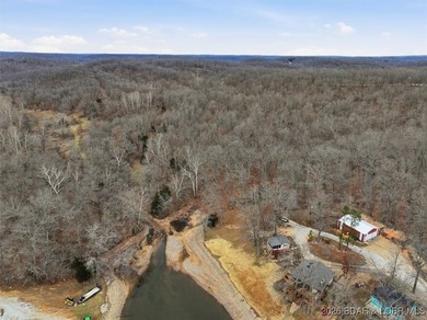 Interested in having BOTH acreage AND lake? This property - photo 24