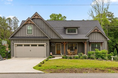 Tucked away on a quiet, country road, this charming like-new - photo 1