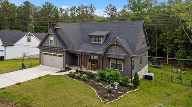 Tucked away on a quiet, country road, this charming like-new - photo 2
