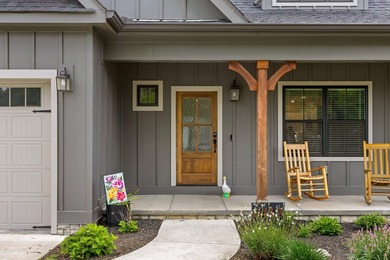 Tucked away on a quiet, country road, this charming like-new - photo 5