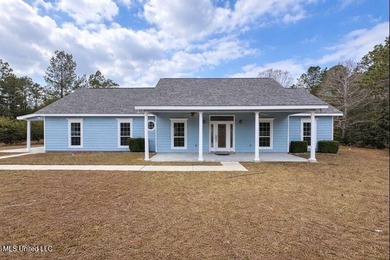 Lake Home For Sale in Kiln, Mississippi