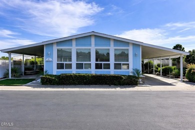 This well-maintained cottage-style manufactured home offers a - photo 1