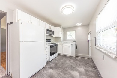 Quiet tree lined street this 3BR/2BA ranch home is located in a - photo 9