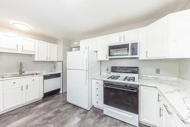 Quiet tree lined street this 3BR/2BA ranch home is located in a - photo 10