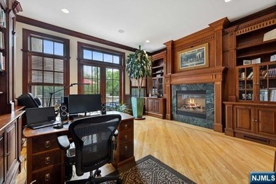 MAJESTICALLY SET ON 2 MANICURED ACRES, THIS BRICK COLONIAL MANOR - photo 11