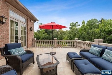 MAJESTICALLY SET ON 2 MANICURED ACRES, THIS BRICK COLONIAL MANOR - photo 12