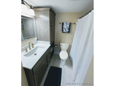 Discover your dream getaway at Lake Ozark! This spacious - photo 14
