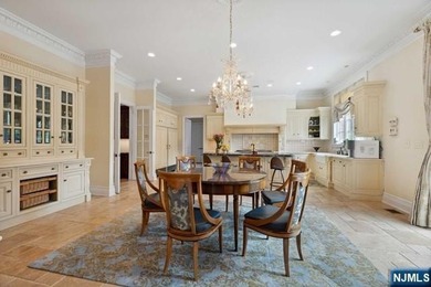 MAJESTICALLY SET ON 2 MANICURED ACRES, THIS BRICK COLONIAL MANOR - photo 14