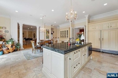 MAJESTICALLY SET ON 2 MANICURED ACRES, THIS BRICK COLONIAL MANOR - photo 17