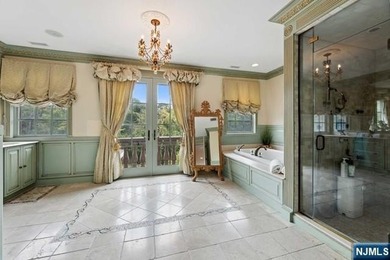MAJESTICALLY SET ON 2 MANICURED ACRES, THIS BRICK COLONIAL MANOR - photo 21