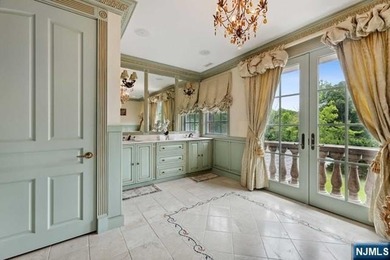 MAJESTICALLY SET ON 2 MANICURED ACRES, THIS BRICK COLONIAL MANOR - photo 22
