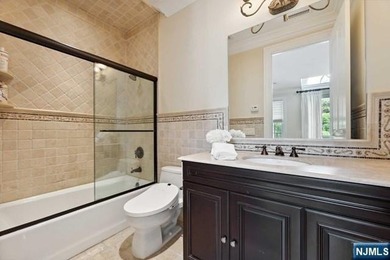 MAJESTICALLY SET ON 2 MANICURED ACRES, THIS BRICK COLONIAL MANOR - photo 27