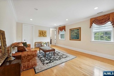 MAJESTICALLY SET ON 2 MANICURED ACRES, THIS BRICK COLONIAL MANOR - photo 28