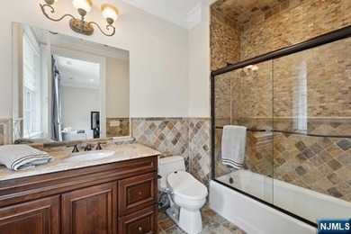 MAJESTICALLY SET ON 2 MANICURED ACRES, THIS BRICK COLONIAL MANOR - photo 31