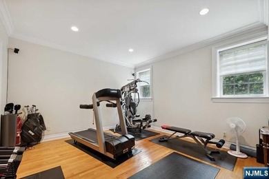 MAJESTICALLY SET ON 2 MANICURED ACRES, THIS BRICK COLONIAL MANOR - photo 35
