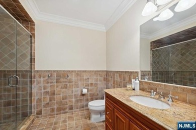 MAJESTICALLY SET ON 2 MANICURED ACRES, THIS BRICK COLONIAL MANOR - photo 36