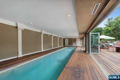 MAJESTICALLY SET ON 2 MANICURED ACRES, THIS BRICK COLONIAL MANOR - photo 39