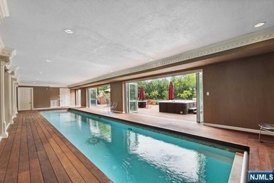 MAJESTICALLY SET ON 2 MANICURED ACRES, THIS BRICK COLONIAL MANOR - photo 40