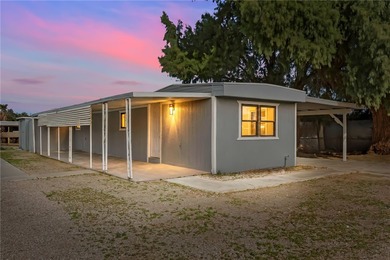 Move-in ready, recently remodeled factory-built home on owned