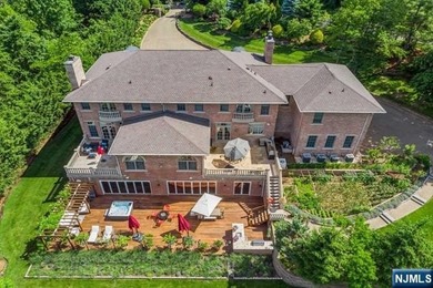 MAJESTICALLY SET ON 2 MANICURED ACRES, THIS BRICK COLONIAL MANOR - photo 49
