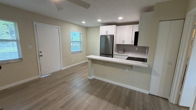 Welcome to this stunning, bright, and cozy 2nd floor condo! This - photo 2