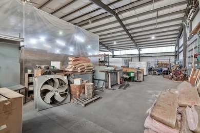 A 27,000 +/- square feet of industrial building on 50 +/- acres - photo 34